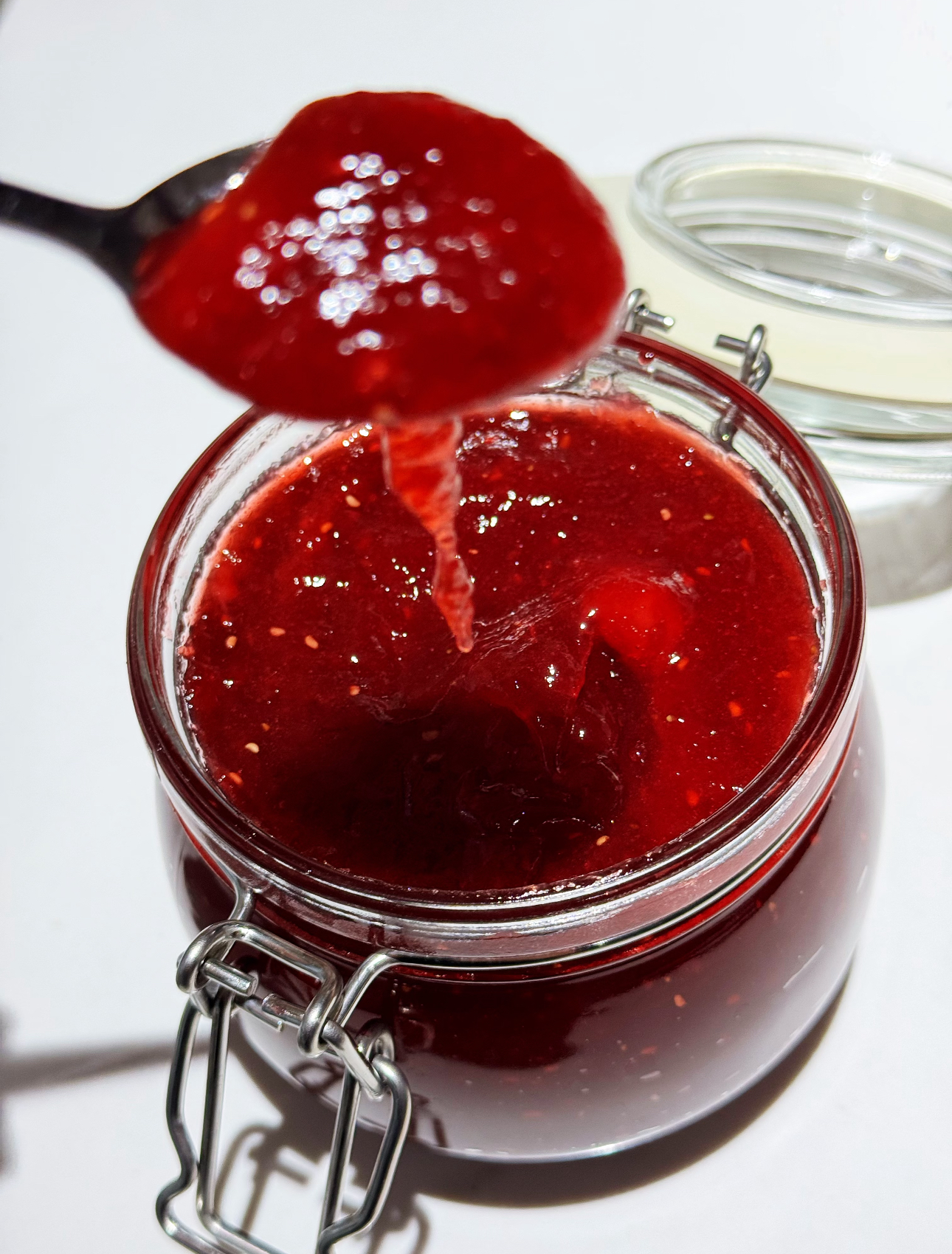 Fresh strawberries macerating with sugar and lemon